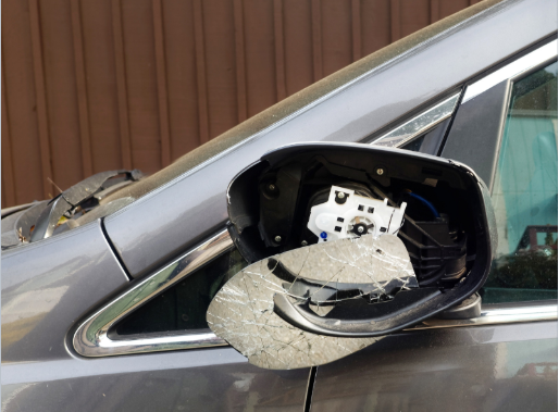 Hit and Run Car Accident Broken Car Mirror